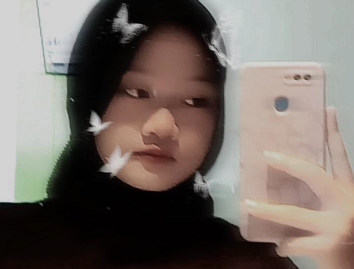 Fiona as a XI RPL 1 student!